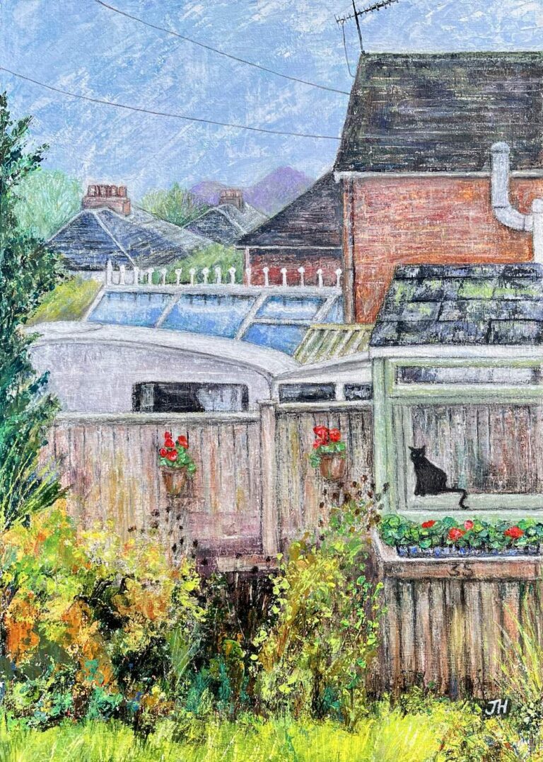 A black cat sitting on a greenhouse windowsill amid colourful plants, viewed over suburban garden fences and rooftops – acrylic and oil pastel by Joan Hudson