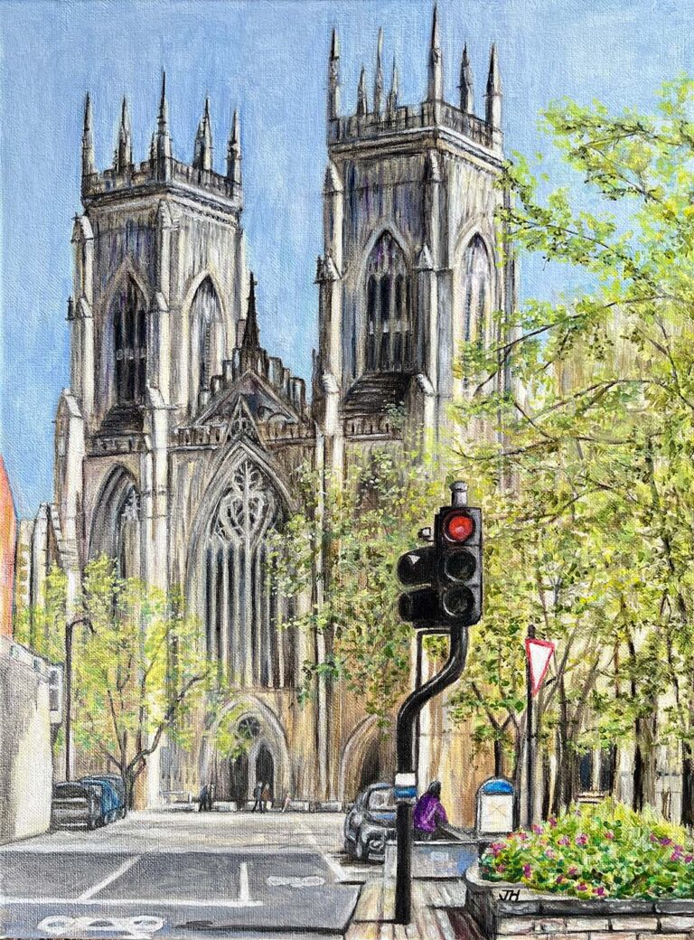 York Minster's twin Gothic west towers seen from street level with spring trees in leaf, traffic lights and parked cars in the foreground – acrylic painting by Joan Hudson